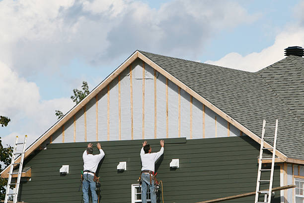 Professional Siding Replacement technician working in Dilliner, PA